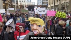 «Марш женщин» в городе Чикаго в американском штате Иллинойс. 21 января 2017 года.