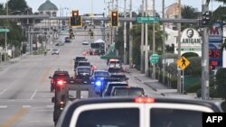 A motorcade with US President Donald Trump travels in Palm Beach on December 20.