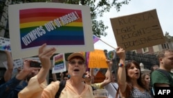 Protesters hold a demonstration against Russian antigay legislation and against the Russian president's stand on gay rights in front of the Russian Consulate in New York on July 31.