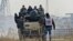 Syrians evacuating a rebel-held area of Aleppo on December 16.