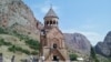 Armenia - Tourists at the 13-14th century Noravank monastery in Vayots Dzor province, August 20, 2016.