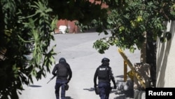 Полицейские у резиденции президента Гаити в Порт-о-Пренсе