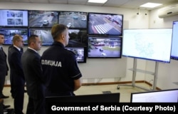 Former Serbian Interior Minister and current Director of the Security Intelligence Agency Aleksandar Vulin (2nd left) visits a police station in Belgrade in 2021.