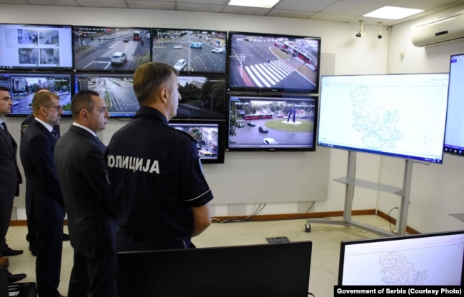 Former Serbian Interior Minister and current Director of the Security Intelligence Agency Aleksandar Vulin (2nd left) visits a police station in Belgrade in 2021.