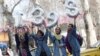 Iranian girls hold up numbers forming the Persian new year 1398 ahead of Norouz in Tehran on March 20.