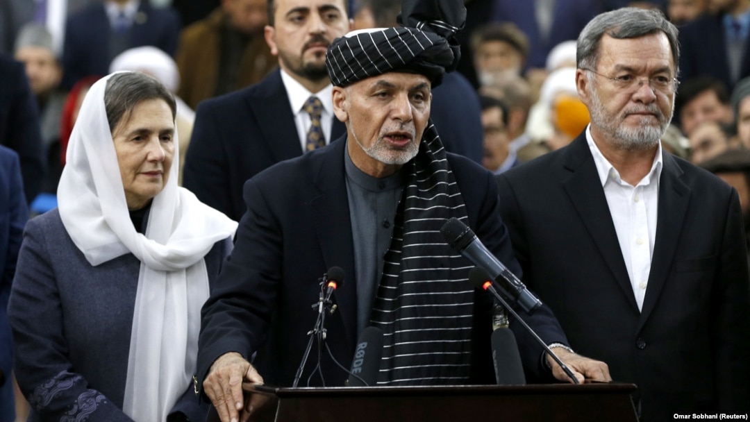 Afghan President Ashraf Ghani (center) is up against warlords, former communists, and mujahedin.