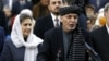 Afghan President Ashraf Ghani, alongside his wife, Rula Ghani, speaks to the media in January 2019 in Kabul.