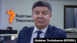 Алмамбет Шыкмаматов.