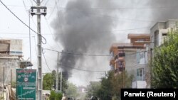Smoke rises from an area where explosions and gunshots were heard in Jalalabad on July 28.