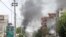Smoke rises from an area where explosions and gunshots were heard in Jalalabad on July 28.
