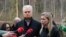 Lithuanian President Gitanas Nauseda (left) speaks to the media next to U.S. Ambassador to Lithuania Kara C. McDonald at the site of a rescue operation at the Pabrade training ground.