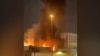 Dubai - smoke rising near the US Consulate after a drone struck a nearby parking lot - screen grab AFP UGC
