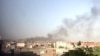 دود ناشی از حمله هوایی آمریکا به یک خودروی حامل مواد منفجره گروه داعش