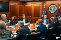Presidenti Biden në takim me zyrtarë të lartë të sektorit të sigurisë.