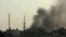 A video posted on April 5 shows smoke billowing from reported shelling in Duma, outside Damascus.
