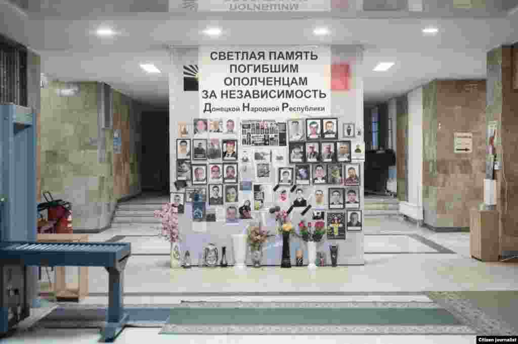 Donetsk, Ukrain. The city administration, administration of Donetsk people republic also. Memorial wall with portrets of killed civilians and soldiers.