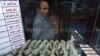 Lack Of Currency 'Halts' Iran Imports