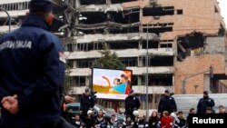 Serbia -- People sit and block a street during an anti-European Union protest in Belgrade, 08Apr2013