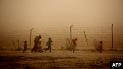 Një kamp i përkohshëm refugjatësh në Siri.