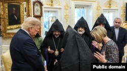 U.S. - President Donald Trump and Paula White-Cain pray with spiritual leaders of the Armenian community in the U.S. at the White House, September 16, 2026.