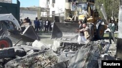 General view of damage after a car bomb exploded outside a police station in Chabahar, Iran, December 6, 2018. Tasnim News Agency /Reuters