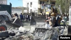 General view of damages after a bomb inside a car exploded outside a police station in Chabahar, Iran December 6, 2018. Tasnim News Agency /Reuters