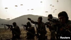 Soldiers participate in a demonstration during the training of the Korean People's Army's air and amphibious combat units. (file photo)