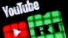 YouTube порталынын жана Орусиянын RT каналынын эн белгилери.