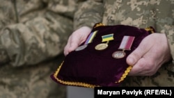 Нагороди вбитого ветерана Юрія Бондаренка