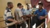 A security guard frisks visitors entering Baghdad's Imam Musa al-Kadhim shrine on July 27