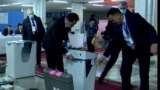 Voting Machine Malfunctions Amid Record Low Turnout In Kyrgyz Parliamentary Elections video grab 2