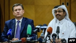 Russian Energy Minister Aleksandr Novak (left) worked with Mohammed bin Saleh al-Sada, president of the Organization of Petroleum Exporting Countries, on a deal to curb output.