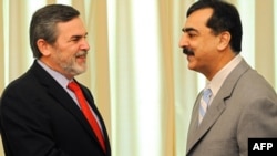 Assistant U.S. Secretary of State Richard Boucher (with Pakistani Prime Minister Yousaf Raza Gilani, right) says the United States wants to help Pakistan fight terrorism on its own territory.