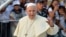 PANAMA- Pope Francis greets the faithful from the popemobile after arriving in Panama City for World Youth Day, on January 23, 2019.