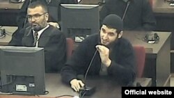 Mevlid Jasarevic (right) speaks in court during his trial.