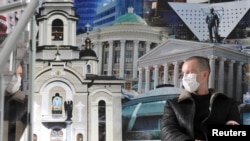 A pro-Russian activist guards the city-council building in the eastern Ukrainian city of Donetsk on April 16.