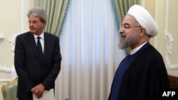 حسن روحانی در کنار پائولو جنتيلونی، وزير امور خارجه ايتاليا در تهران، ۱۴ مرداد