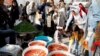 Iranians go shopping at a street market for the New Persian Year, called Norouz, in Tehran, March 19, 2018