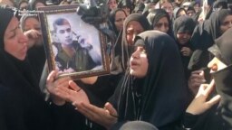 WATCH: Iranian City Mourns Victims Of Military Parade Attack