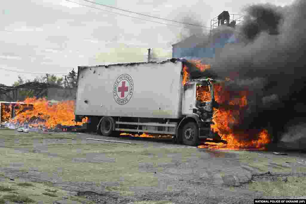 A Red Cross vehicle burns after being hit by a Russian strike on Ukraine&#39;s Donetsk region.&nbsp;