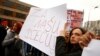 BOSNIA-HERZEGOVINA -- Protesters hold a placard saying "For our children" during a protest against abuse in an institution for children with special needs after photographs emerged of children tied to beds and radiators, in Sarajevo, November 21, 2019