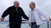 Pushing ahead with crackdowns: Russian President Vladimir Putin (right) and Belarusian leader Alyaksandr Lukashenka on the Black Sea on May 29.