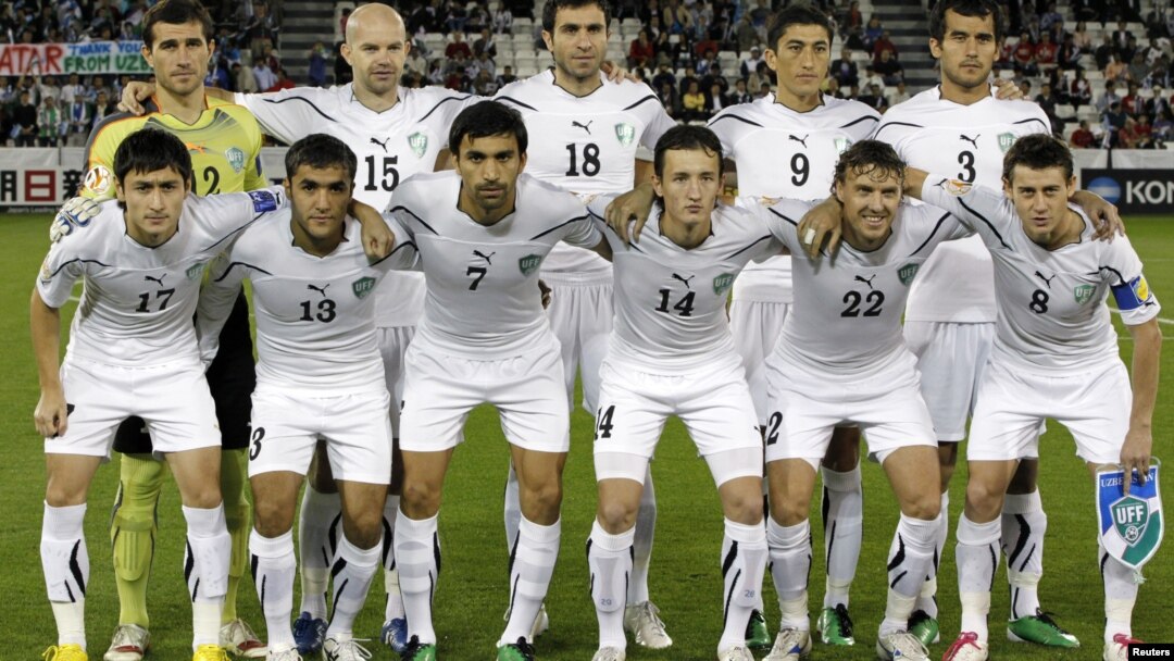 The Uzbek national soccer team poses for a group photograph during the 2011 Asian Cup.
