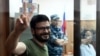 Ilya Yashin appears at a court hearing in Moscow on July 13.