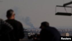 Tehrana raket zərbəsindən sonra qalxan tüstü