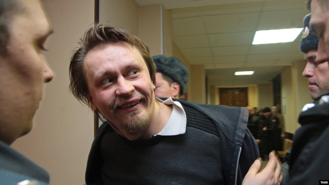 Voina founder Oleg 'Vor' Vorotnikov outside a courtroom on February 21.