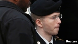 Bradley Manning is escorted into court to receive his sentence at Fort Meade in Maryland on August 21.