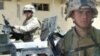 U.S.: Military Families Grieve The Fallen As Casualty Toll Tops 1,000 In Iraq War