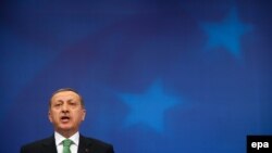 Türkiýäniň premýer-ministri Rejep Taýyp Erdogan çykyş edýär. Belgiýa. Ýanwar, 2014 ý.