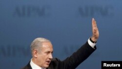 U.S. - Israeli Prime Minister Benjamin Netanyahu waves after speaking at the American Israel Public Affairs Committee (AIPAC) policy conference in Washington, 05Mar2012